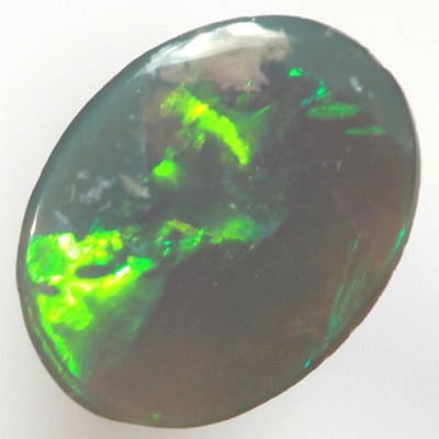 SOLID SEMI BLACK OPAL Bright green rolling flashes